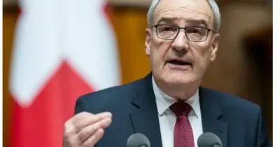 Swiss President Guy Parmelin to leave government at year-end